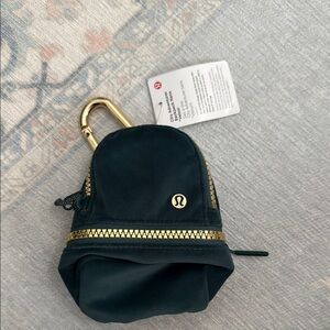 Lululemon Athletica Green and Gold City Adventurer Backpack Keychain